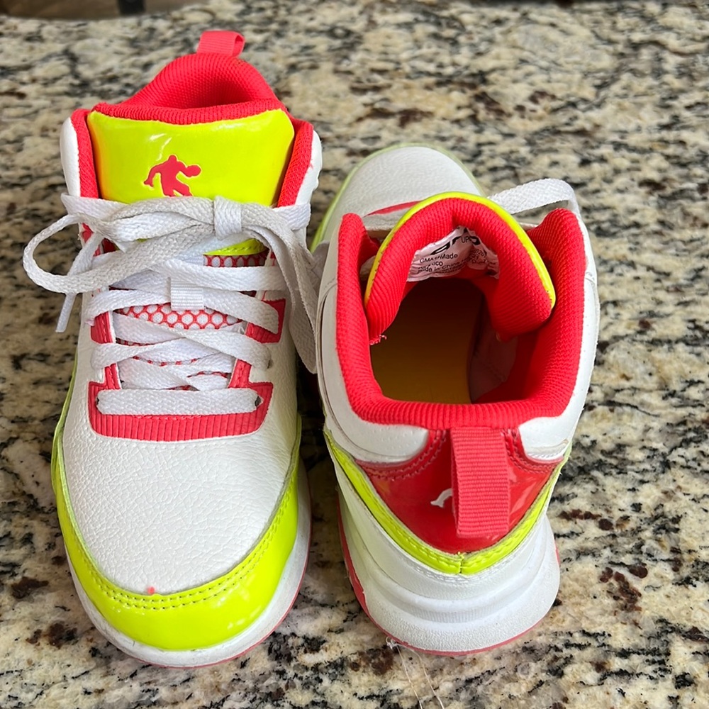 Like new! Girls, And1 hot pink and neon yellow high top tennis shoes